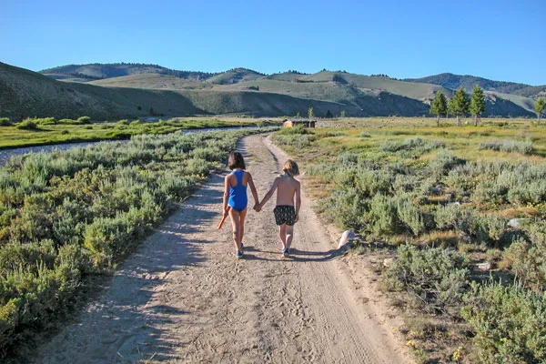 Family walking a trail in Idaho