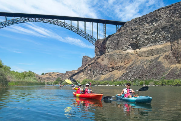 Youth kayaking on Snake River