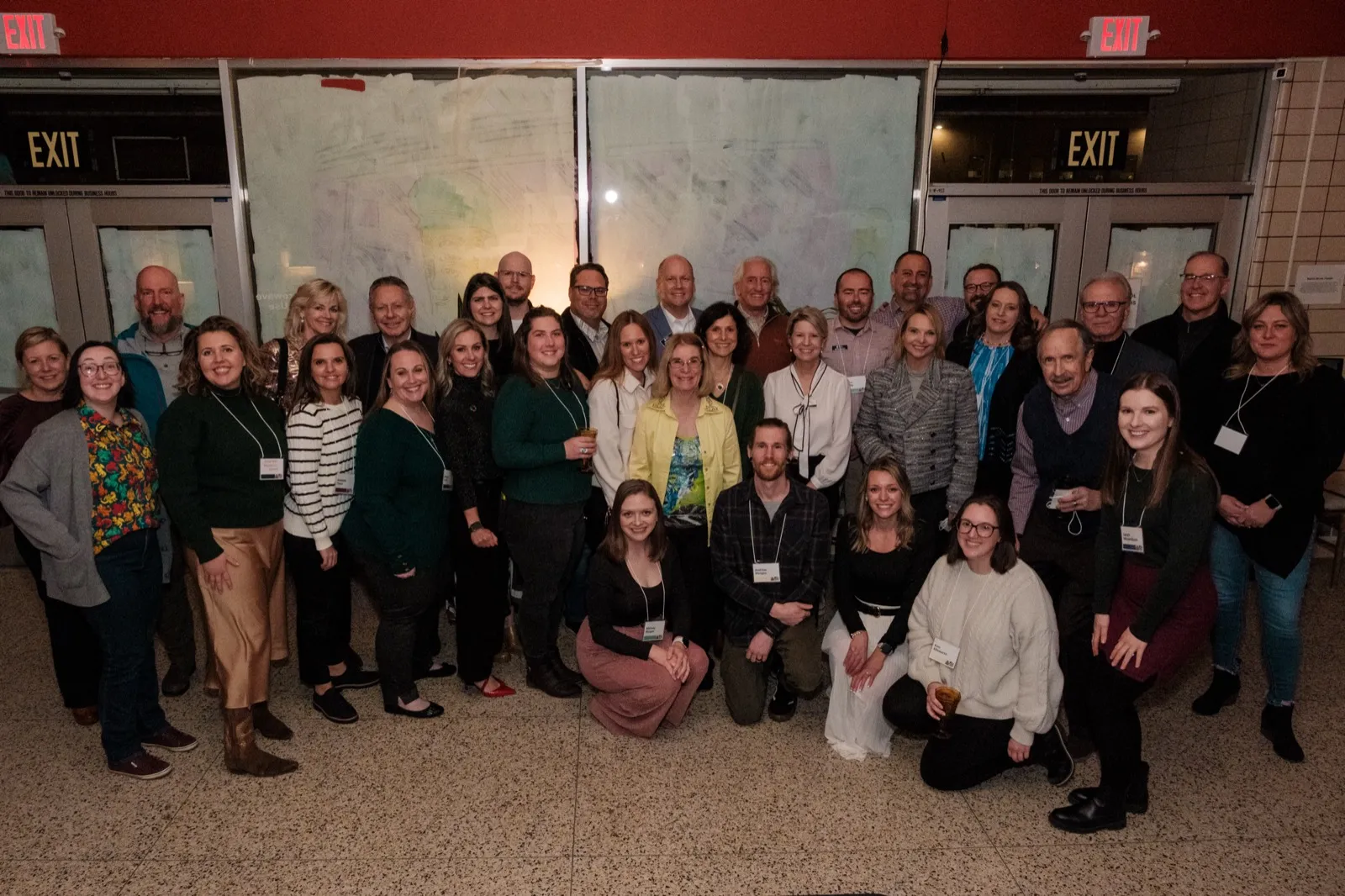 2024 merger party with staff, board, and guests